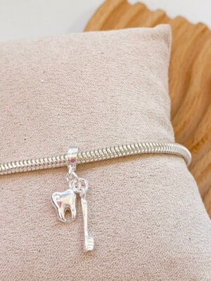 BERLOQUE DENTE + ESCOVA LISO PENDENTE