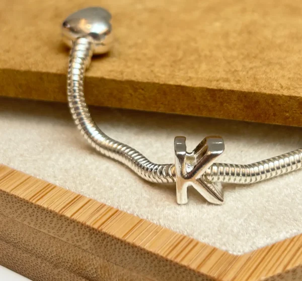 BERLOQUE LETRA "K" SEPARADOR
